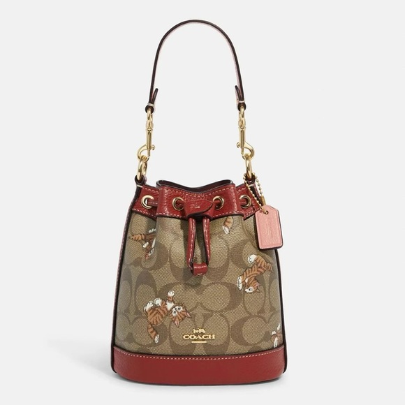 Coach MINI DEMPSEY BUCKET BAG IN SIGNATURE CANVAS WITH DANCING KITTEN PRINT NWT - Picture 1 of 14